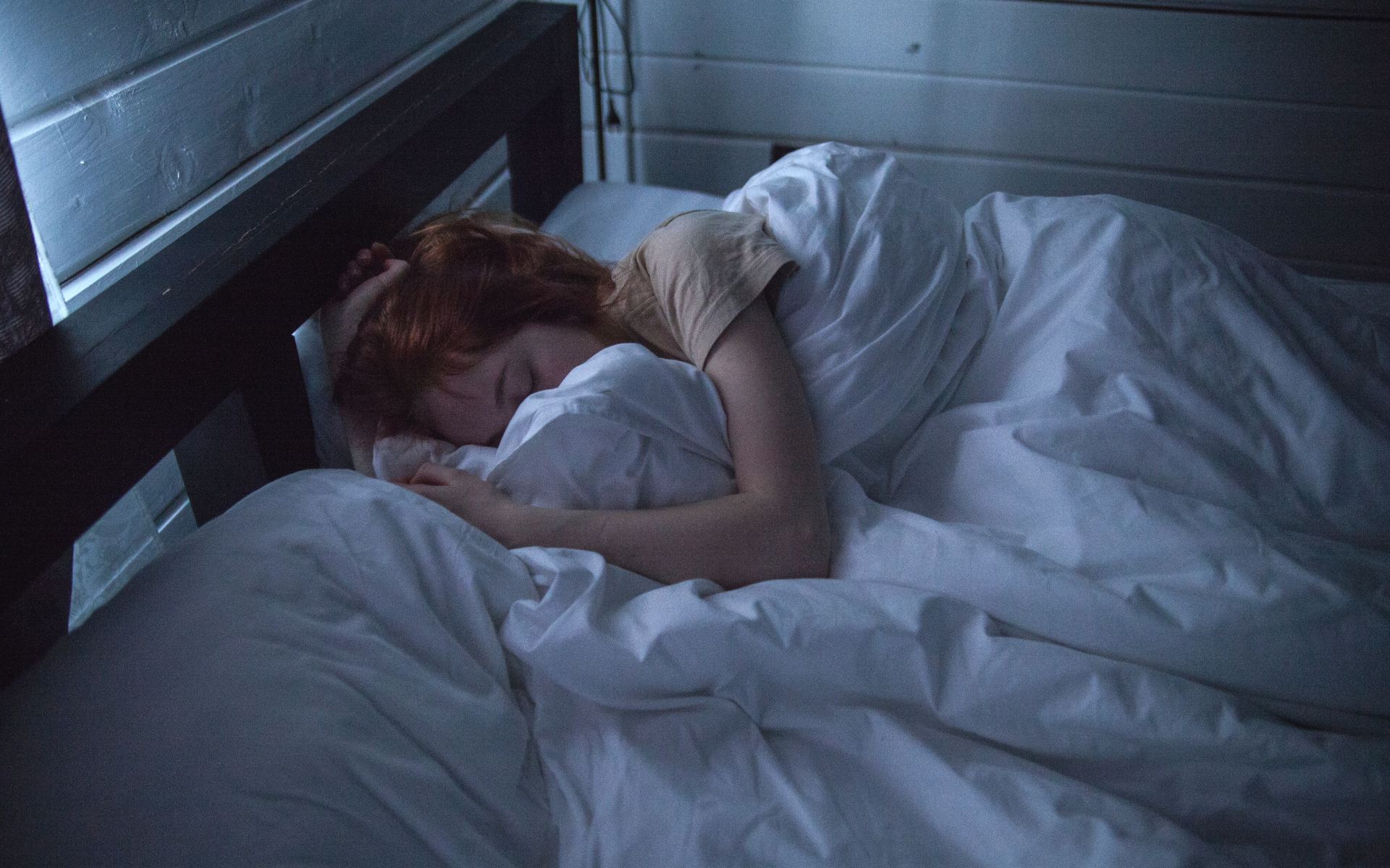woman sleeping in bed